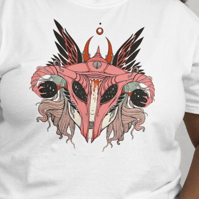 Close Up - Front
Person wearing a white t-shirt with a graphic design 'Celestial Goddess' on a plain background