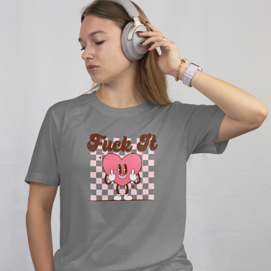 Front view - worn by a model
Person wearing a gray t-shirt with a graphic design "Fuck It" while listening to music with headphones on a plain background