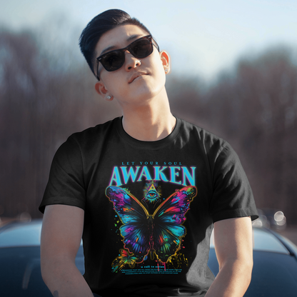 Person wearing a black t-shirt with a colorful butterfly design and 'Awaken' text.