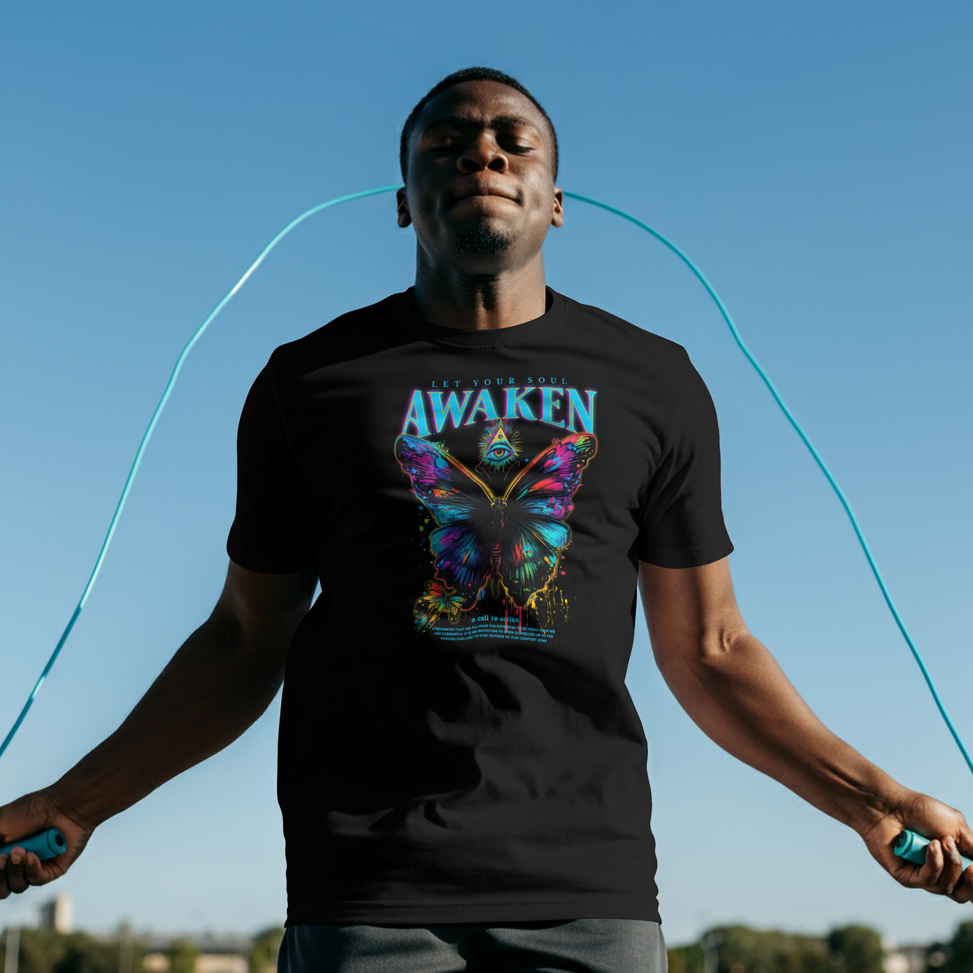 Man jumping rope outdoors with a clear blue sky