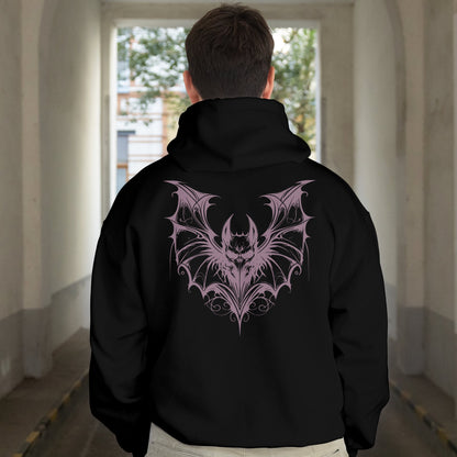Back View
Person wearing a black hoodie with a beautiful purple bat design on the back, standing in a hallway.