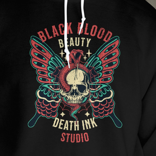 Front View
Black hoodie with a skull and wings design and 'Black Blood -Death Ink Studio' text.
