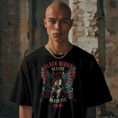 Person wearing a black t-shirt with a graphic design in an urban setting