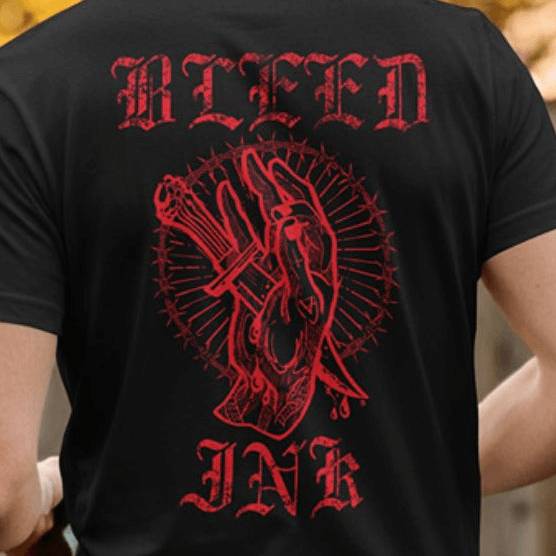 Black tattoo inspired Graphic t-shirt featuring bold 'BLEED INK' artwork on the back.