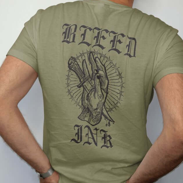 Sage tattoo inspired Graphic Tee featuring a hand design and 'BLEED INK' text on the back.