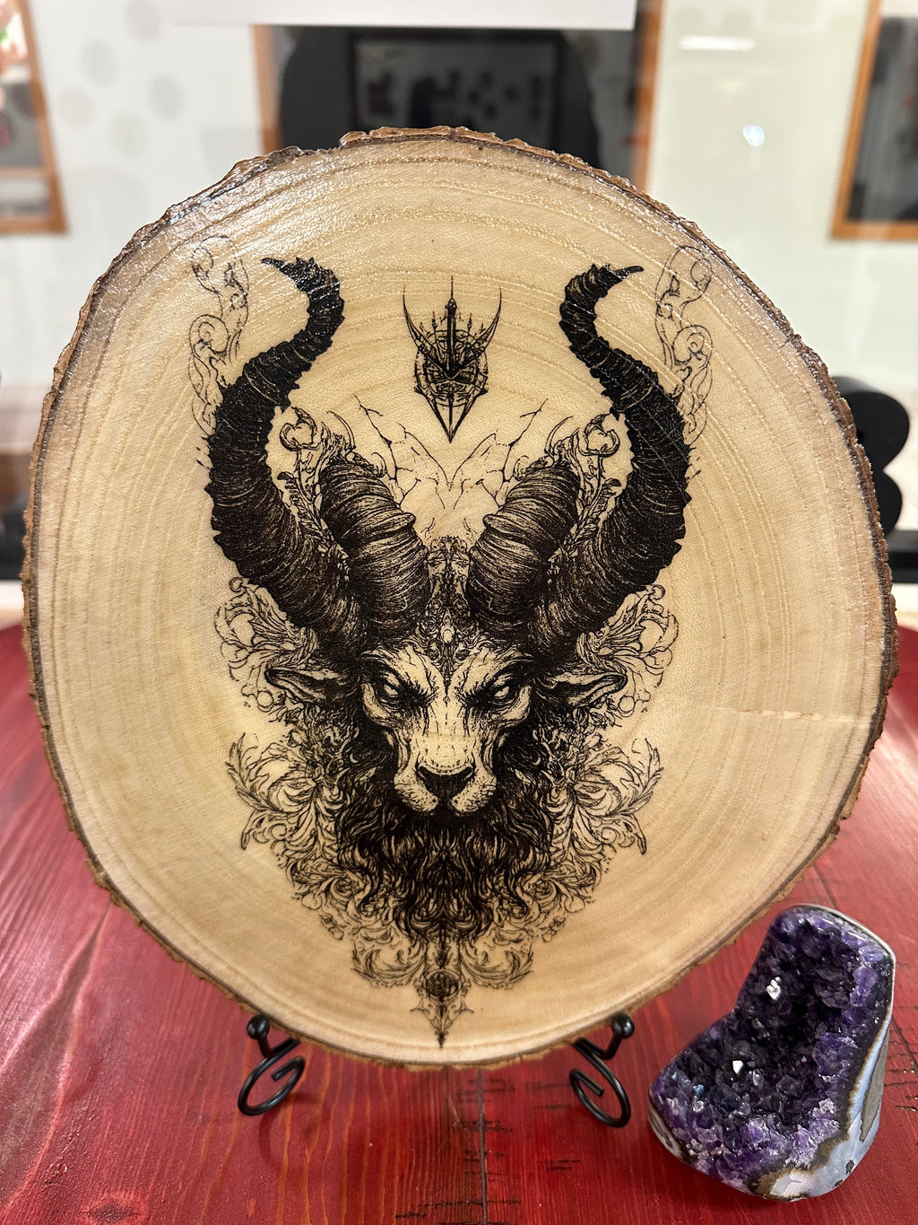 Close Up - Front View laser engraved birch wood decor Kamira on a stand 