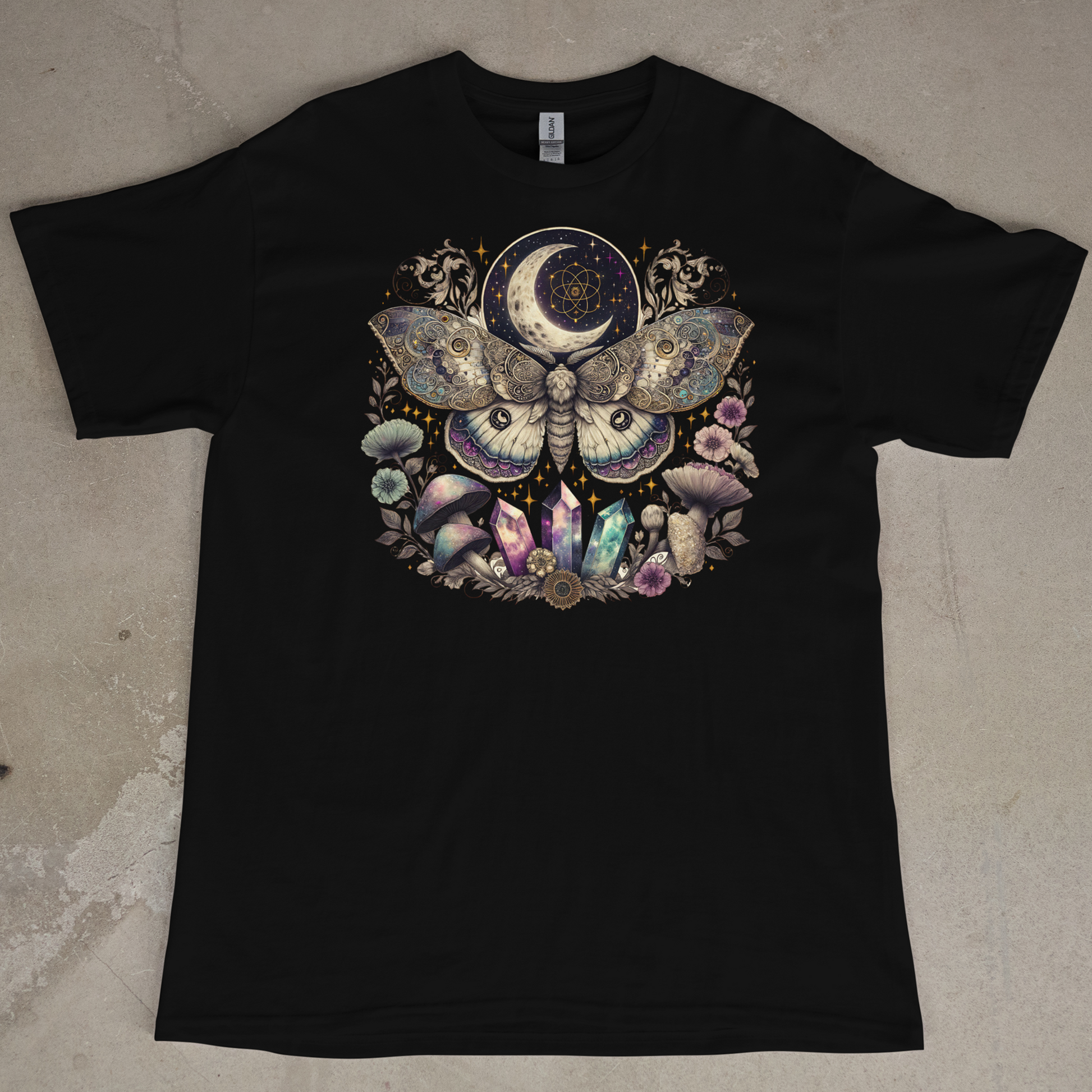 Black t-shirt with a colorful Moth and moon design on a textured surface