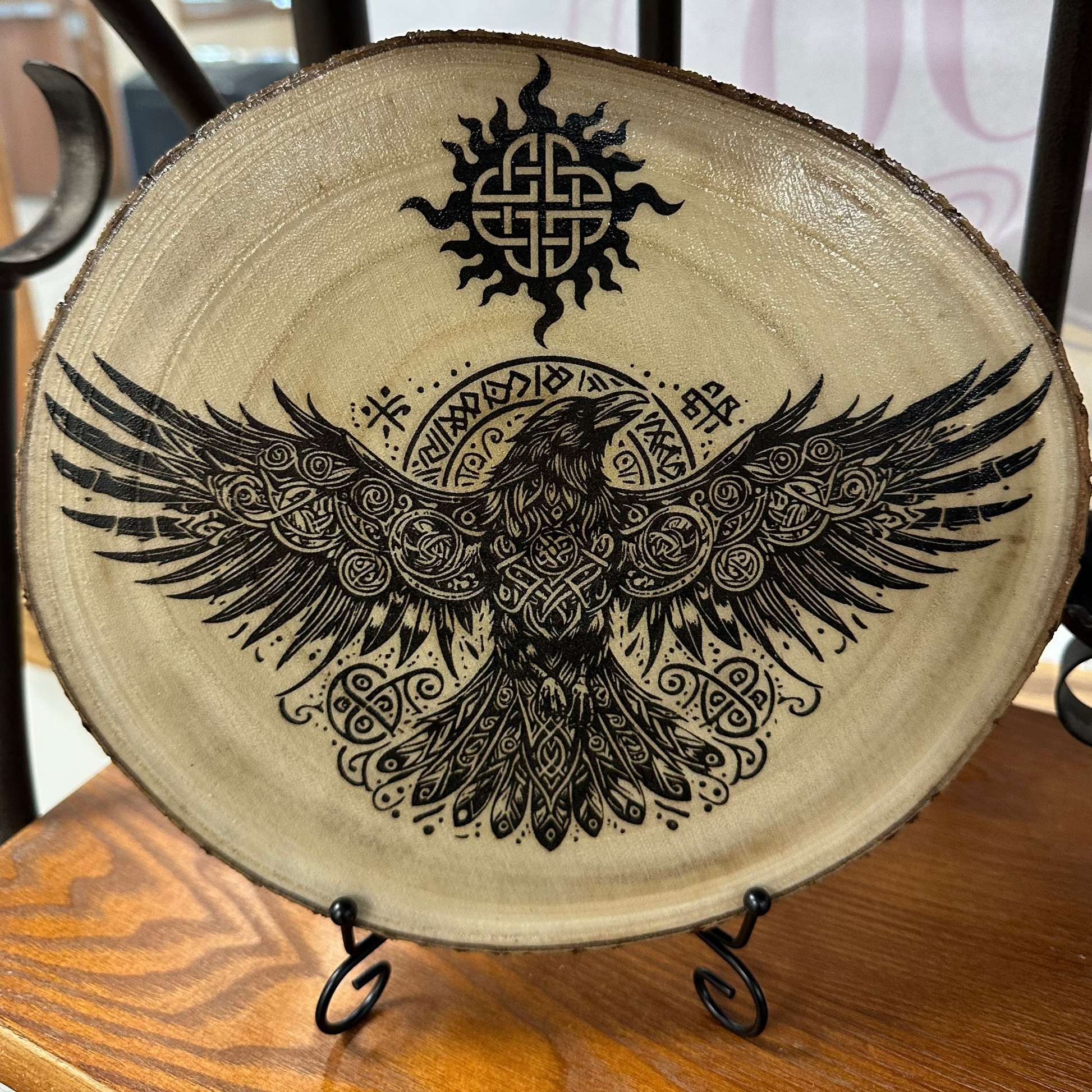 Close Up - Front View Nordic Raven Laser Engraved Wood Home Decor on a stand 