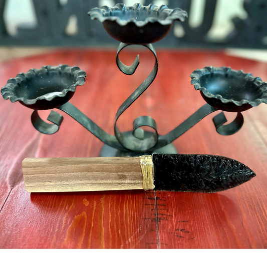 Hand-chipped obsidian knife with cherry wood handle. Blunted decorative display piece. Ancient craftsmanship meets natural elegance. Unique collector's item.
