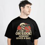 Front View Person wearing a Black Gildan Oh Look Nobody Gives a Shit T-Shirt