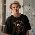 Person wearing a Black Rise and Thrive t-shirt