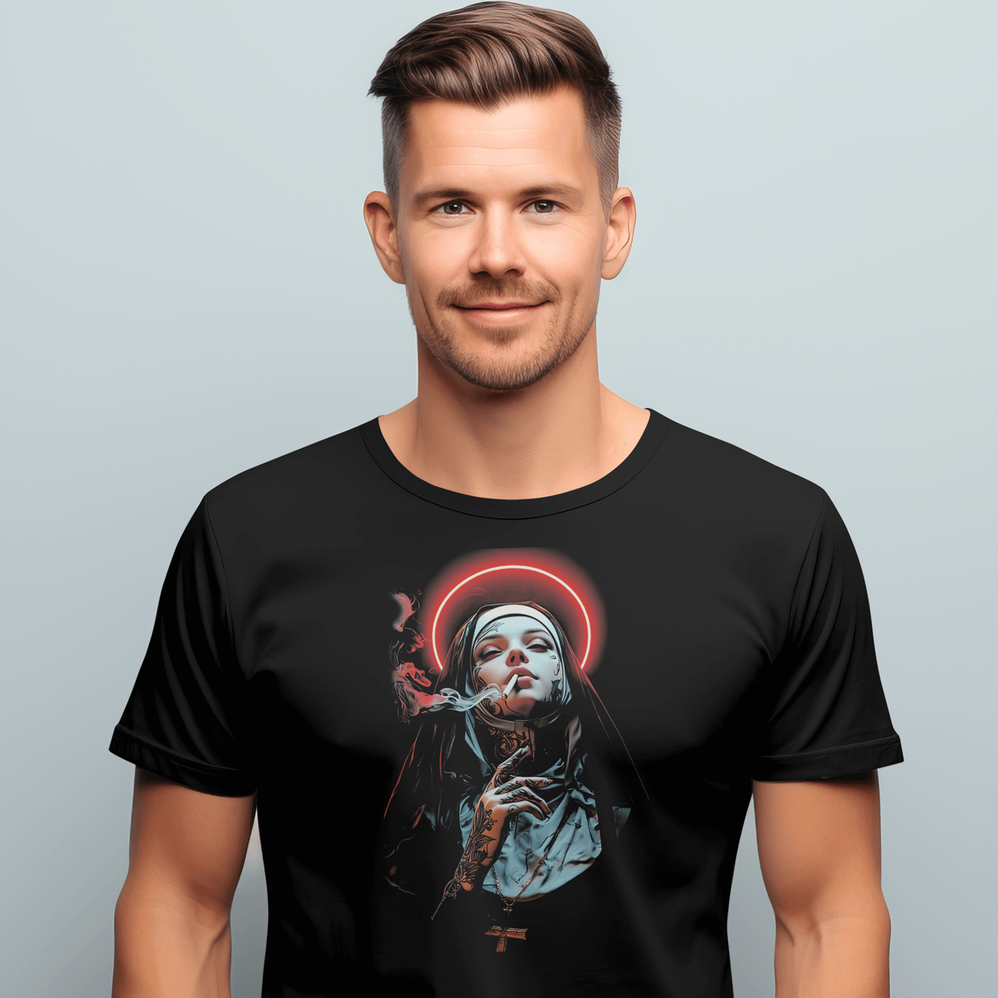 Man wearing a black t-shirt with a graphic design on a light gray background