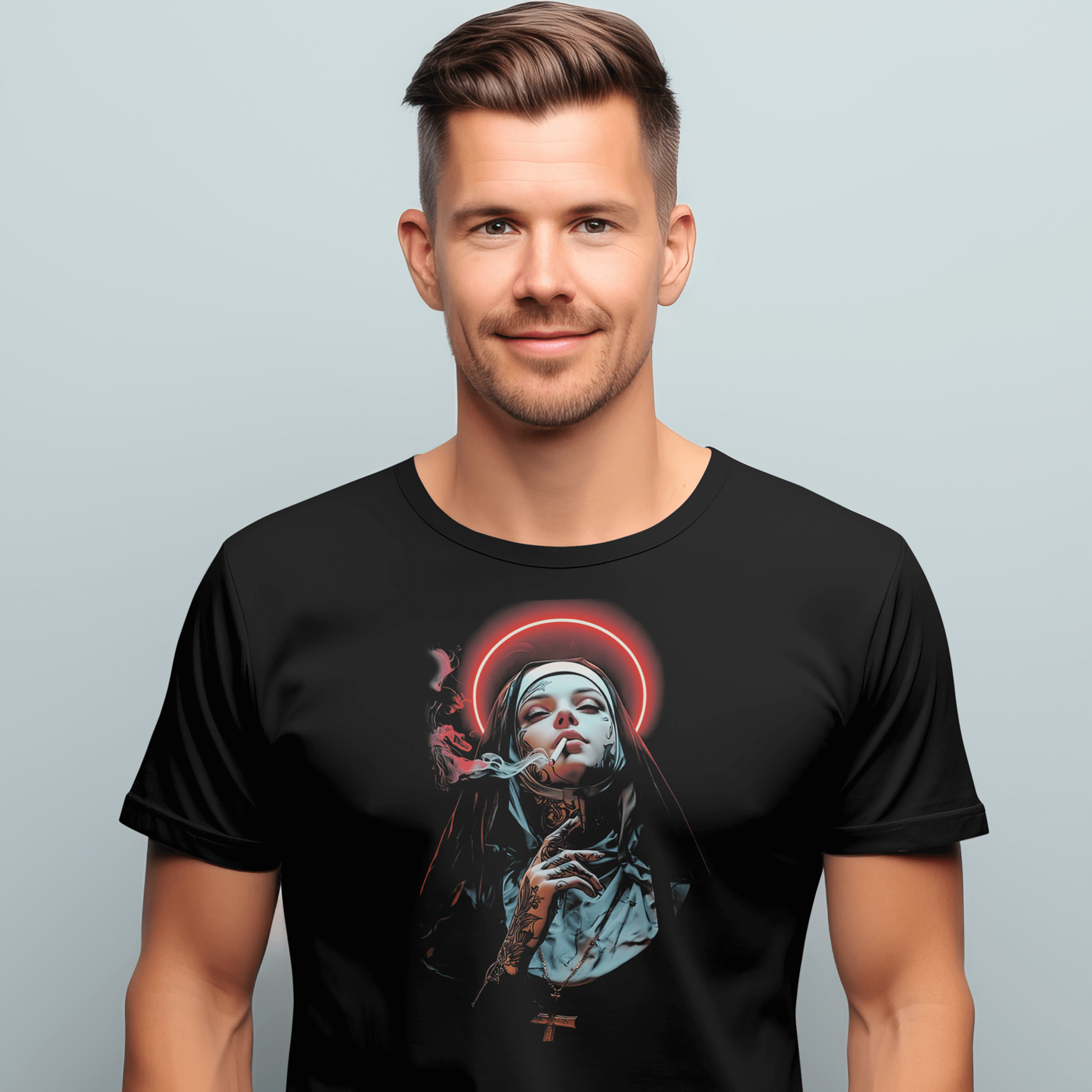 Man wearing a black t-shirt with a graphic design on a light gray background