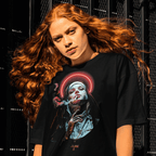 Person wearing a black t-shirt with a graphic design against a dark background