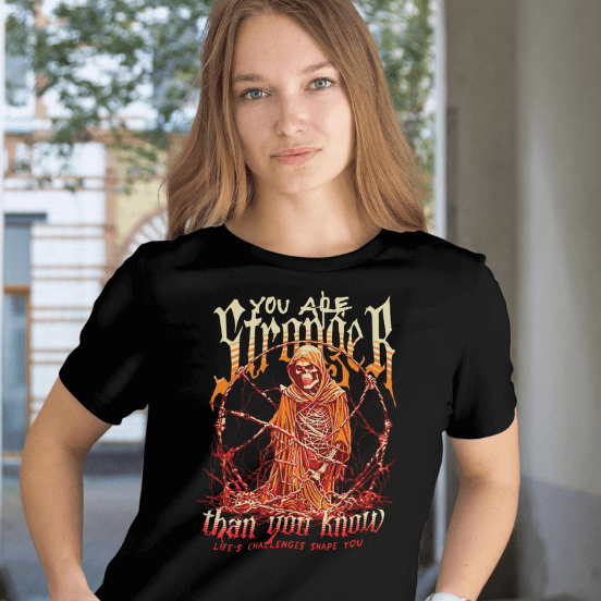 Front view Black Stronger T-Shirt being worn by a woman