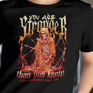 Close Up - Front View
Black t-shirt with a graphic design featuring a skeleton and text "You Are Stronger" on a plain background