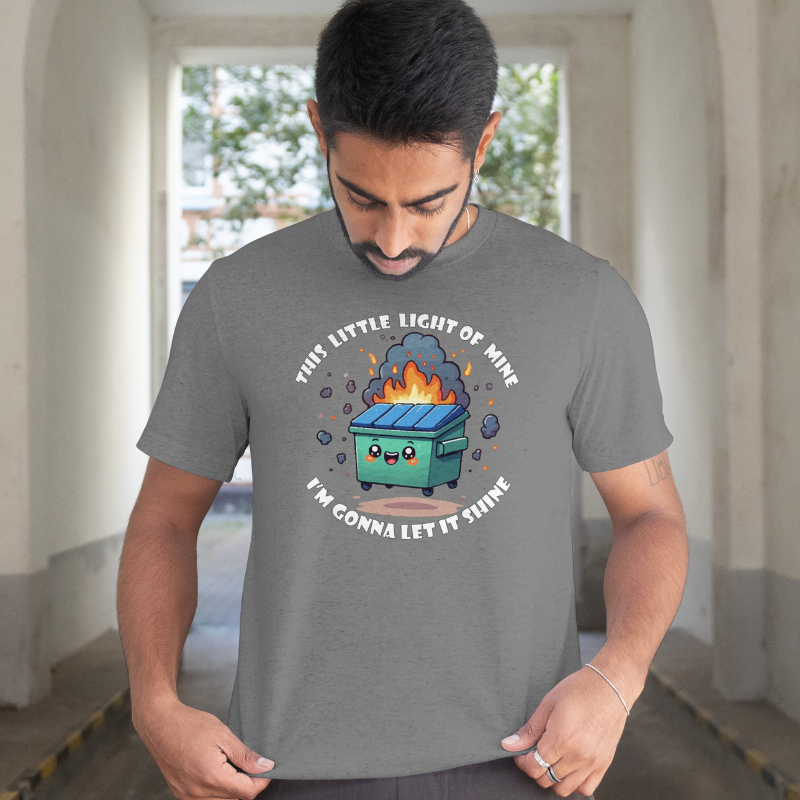 Man wearing a gray t-shirt with a graphic design and text.