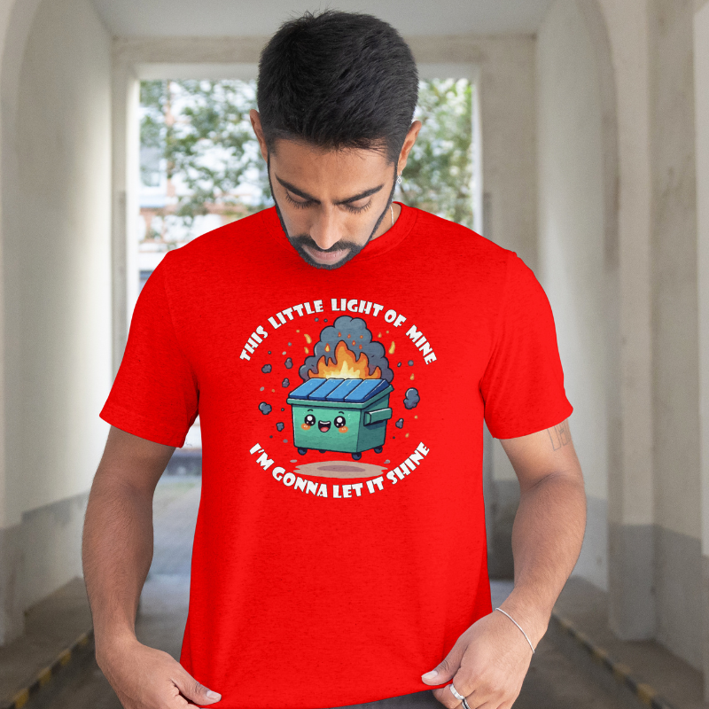 Person wearing a red t-shirt with a graphic design and text.