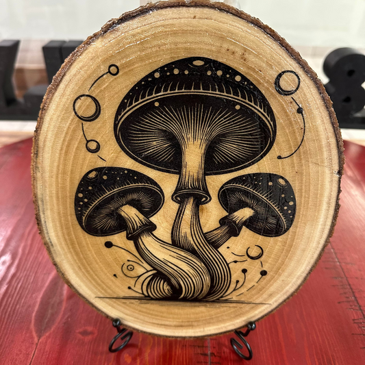 Close Up - Front View on a stand
Round-Wooden Plaque with mushroom design on a red surface