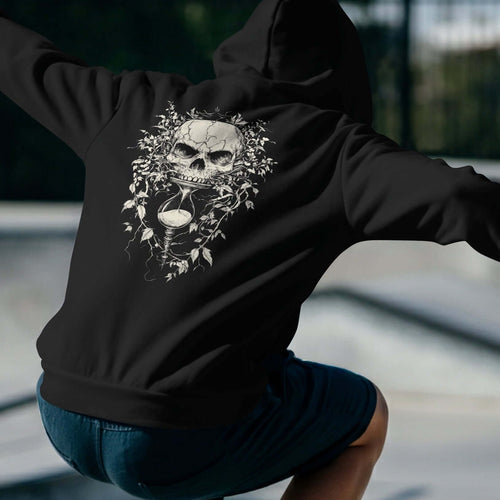 Man wearing a heavyweight skull-hourglass hoodie with a unique skull design, showcasing comfort and style.